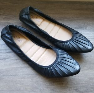 Me Too black leather flats with elastic backing